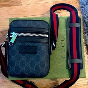 Black Gucci messenger bag